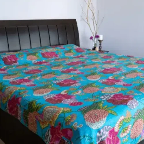 Playful blue kantha bedcover